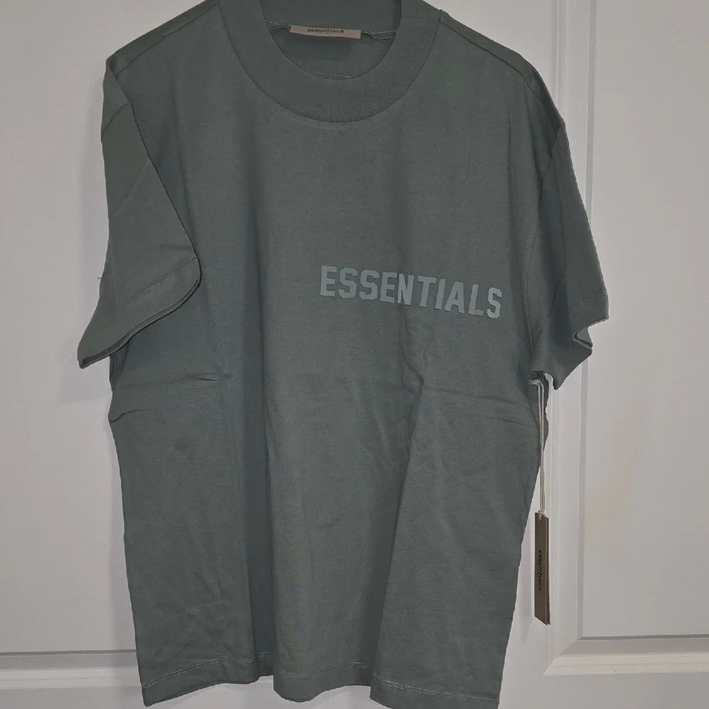 Fear Of God Essentials Embossed Logo T-Shirt in Sage/Sycamore - Picture 3 of 6